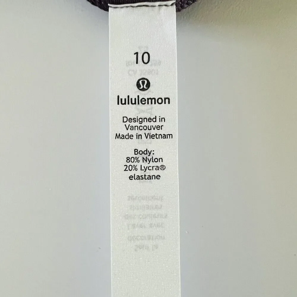 LULULEMON ATHLETICA Heathered Currant Invigorating HR Crop 23